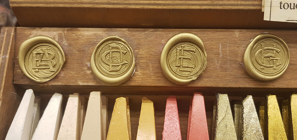 Wooden gift box with seal, sealing wax and burner