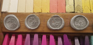 Wooden gift box with seal, sealing wax and burner