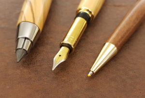 Fountain pen, mechanical pencil and ballpoint pen of olive wood
