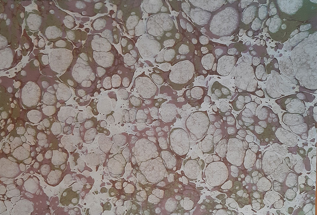 Reproduction of a marbled paper.