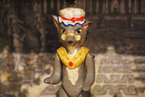Wolf, small terracotta puppet composed of five jointed pieces decorated by hand