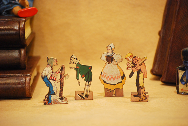 Geppetto, Pinocchio, the Fairy and Mastro Ciliegia, small wooden hand-fertworked silhouettes