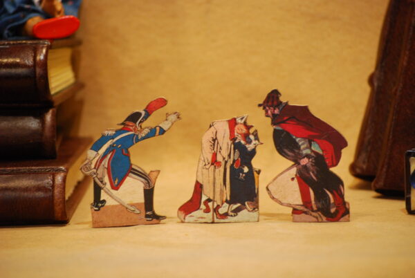 Characters from the tale of Pinocchio, wooden hand-fretworked silhouettes